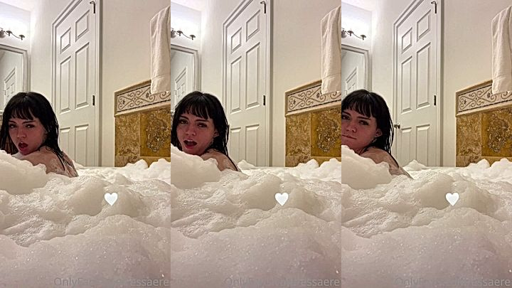 essaere taking her bath in the bath in the bath tub